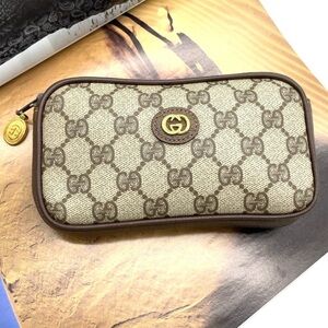 Auth Gucci GG Supreme Marmont GD
Brown PVC Leather Pouch